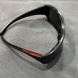 Prada men’s Black and Red Sunglasses